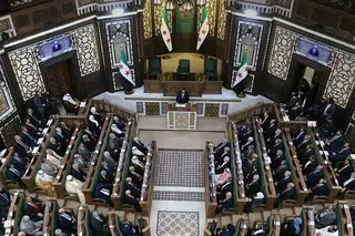 Syria’s President Ahmed al-Sharaa addresses the first meeting of Syria’s new transitional parliament in Damascus on Sunday. Photo: AFP