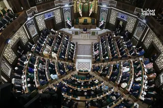Syria's President Ahmed al-Sharaa (top, C) speaking during the first meeting of Syria's new transitional parliament in Damascus