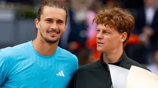 Jannik Sinner and Alexander Zverev pose with their trophies after the Madrid Open