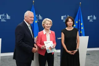 European Commission President Ursula von der Leyen, center, poses with co-chairs of the Special Panel Maria Melchior, right, and Jörg M. Fegert during a report on children's safety online at EU headquarters in Brussels, Monday, July 13, 2026. (AP Photo/Marius Burgelman)