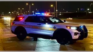 Illinois State Police car at night