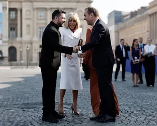 Ukraine’s Volodymyr Zelenskyy gets welcomed by French PM and French First Lady ahead of the Bastille Day parade in Paris.