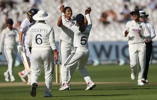 India bowler Sayali Satghare celebrates the wicket of England batter Alice Capsey during day three of the 1st Women's Rothesay Test Match between England and India at Lord's Cricket Ground on July 12, 2026 in London, England.