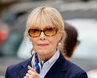 a woman in dark glasses