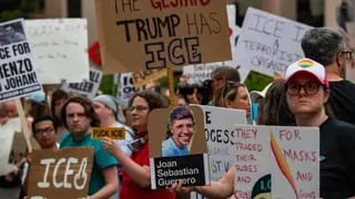 'ICE must leave the state of Maine': protesters march after fatal shooting - video