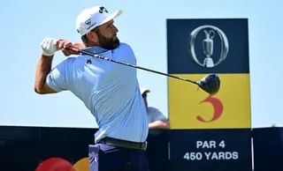 Jon Rahm watches his drive from the 3rd tee during practice at the 154th Open.