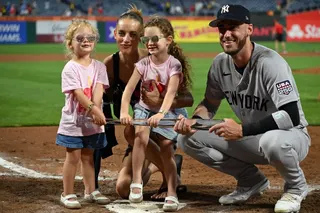 Cody Bellinger reacts with his family.