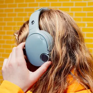 Image may contain Electronics Headphones Brown Hair Hair Person and Adult