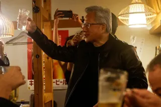 Nvidia CEO Jensen Huang proposes a toast during dinner at an izakaya  in Tokyo on Wednesday. Photo: Reuters