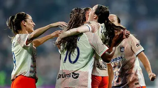 Rose Lavelle celebrates with her team-mates