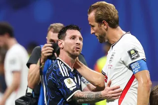 Lionel Messi with England captain Harry Kane