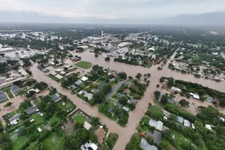 This aerial photo provided by David Fry shows flooding in Uvalde, Texas, on Thursday, July 16, 2026. (David Fry/Medina Real Estate Photography via AP)