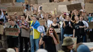 Protesters during a demonstration against the dismissal of Mykhailo Fedorov, Ukraine's defense minister, in Kyiv, Ukraine