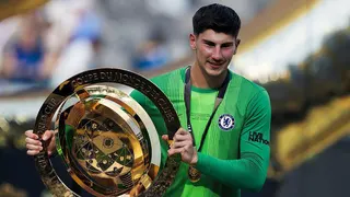 Mike Penders holding the Club World Cup trophy