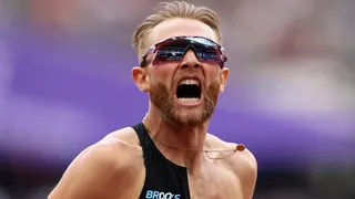 Josh Kerr celebrates after breaking the men's mile world record