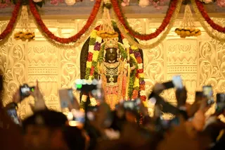 Devotees gather near the idol of Hindu deity Ram at the newly consecrated temple in Ayodhya on January 22, 2024. A probe into donations allegedly siphoned off at India’s grand Ram temple in 2026 has renewed scrutiny of how religious sites manage billions of cash and gold entrusted to them by devotees. — AFP pic