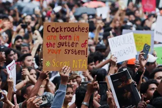 Cockroach Janta Party (CJP) supporters hold banners during a protest after authorities moved Sonam Wangchuk to a hospital during his hunger strike, as demonstrators demand the resignation of Indian Education Minister Dharmendra Pradhan, in Mumbai, India, July 19, 2026. REUTERS/Francis Mascarenhas