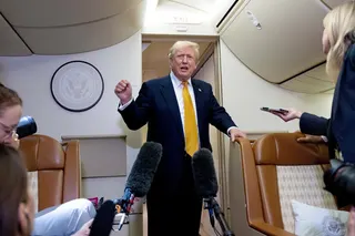 US President Donald Trump speaks with reporters in flight on Air Force One after landing at US Air Force Base at RAF Mildenhall, in Suffolk, Britain, on July 8, 2026. Photo: AP