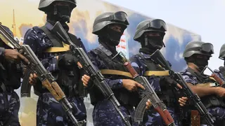 Houthi troops stand guard during a protest against Saudi Arabia, in Sanaa, Yemen (17 July 2026)