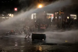 Water cannon being used on protesters on Monday night.