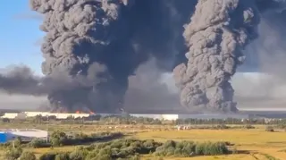 Smoke billows from a warehouse in Elektrostal