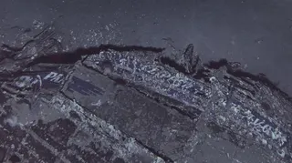 Close-up image of the Clipper Endeavor wreckage showing the Pan Am logo