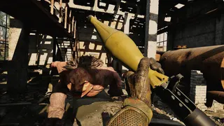 The player loading a rocket launcher as they're attacked by a creature in Stalker 2.