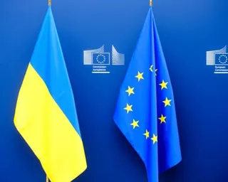 The Ukrainian and the EU flags are seen side by side at the Berlaymont, the EU Commission headquarter in Brussels, Belgium.