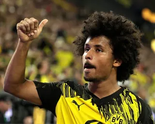 Karim Adeyemi makes a thumbs-up gesture