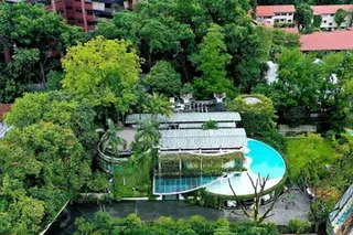 The two-storey bungalow on the site. The latest indicative price reflects S$3,313 psf on the land area.