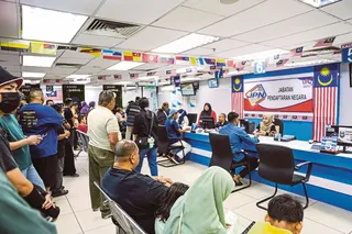 (FILE): The National Registration Department (NRD) is not conducting any special campaign or operations to require the public to update their residential address on their MyKad, nor to take action against those who have yet to do so. — NSTP FILE PIC