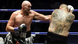 Tyson Fury lands a punch on Mariusz Wach