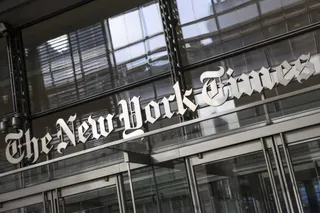 The New York Times logo above the doors of the news organization's building in New York City.
