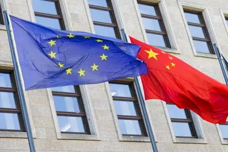 The flags of the European Union and China in Berlin. Photo: Photothek via Getty Images