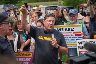a man surrounded by a crowd of people
