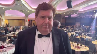 Gary O'Donoghue speaks to camera.