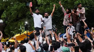 Abhijeet Dipke, head of the Cockroach Janta Party (CJP), celebrates with supporters after the resignation of Education Minister Dharmendra Pradhan over National Eligibility cum Entrance Test (NEET) examination paper leaks, at Jantar Mantar in New Delhi, India July 25, 2026. REUTERS/Francis Mascarenhas TPX IMAGES OF THE DAY
