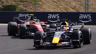 Red Bull's Max Verstappen with Ferrari's Lewis Hamilton behind him during the Hungarian Grand Prix