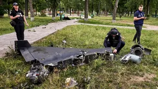 Ukrainian experts inspect drone debris after a strike on Kharkiv in the north-east of the country. Photo: June 2025