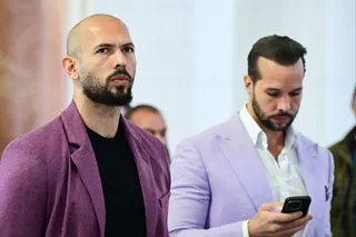 Andrew Tate, left, and his brother Tristan Tate appear in court in Bucharest, Romania, in 2024. Photo: AFP