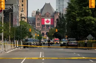 Police tape stretches across University Avenue as Toronto police work at the scene of a shooting at the US consulate in Toronto, Ontario, Canada on Monday. Photo: Reuters