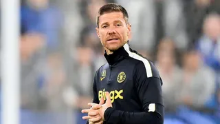 Xabi Alonso clasps his hand together