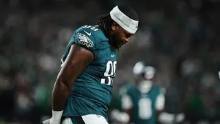 Jalen Carter walks off the field