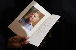 An attendee holding the programme on July 28 for a Congressional tribute to late US Senator Lindsey Graham, at the US Capitol in Washington.