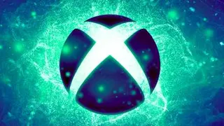 The Xbox orb logo on a glowing, particle-filled background