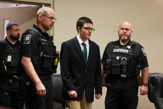 Colt Gray is flanked by police as he is led in to court for his sentencing at Barrow County Superior Court in Winder, Georgia. Photo: Atlanta Journal-Constitution via AP, Pool