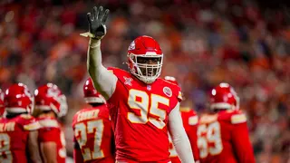 Chris Jones waves to the crowd