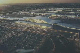 A rendering of the planned renovation of Washington Dulles International Airport is seen in the Oval Office on Wednesday. Photo: AFP
