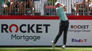 Davis Thompson hits a shot from the first tee during the first round of the 2021 Rocket Mortgage Classic at the Detroit Golf Club.