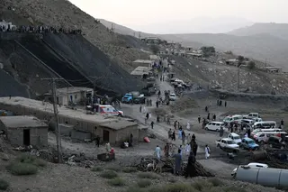Coal miners and relatives gather after a coal mine collapsed in the Sorange area, some 50 kilometres (31 miles) east of Quetta, on July 30, 2026 [AFP]